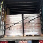 Carga paletizada e amarrada em mudança compartilhada da Facilita Transporte